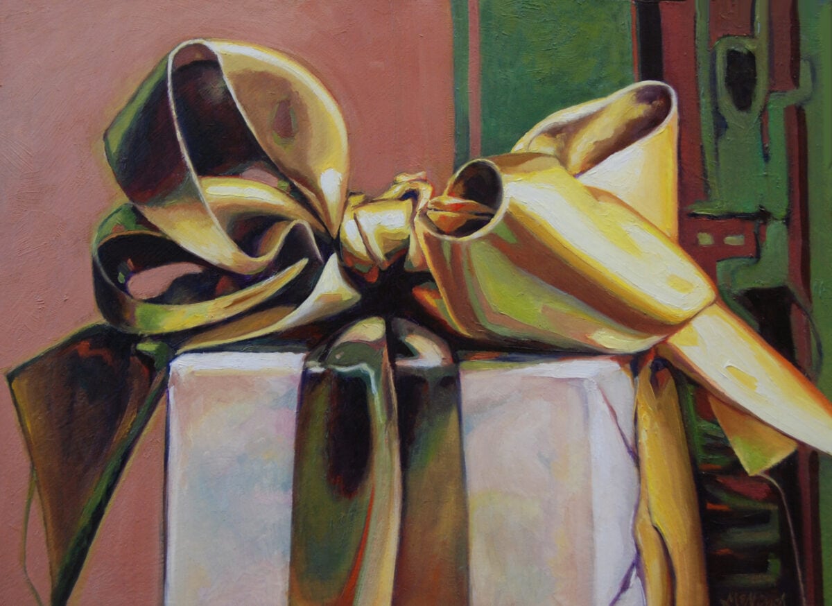 Small gift with large gold satin bow