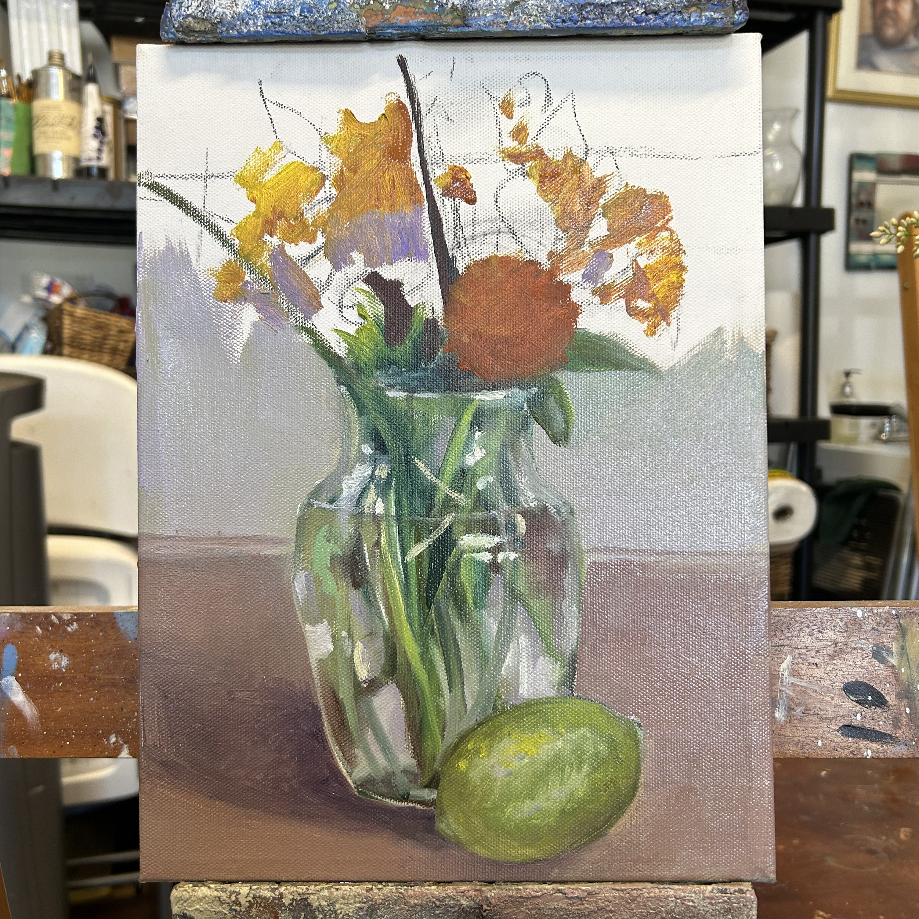 This is an example of Michel McNinch's demonstration of painting a glass vase with flowers and water in it.
